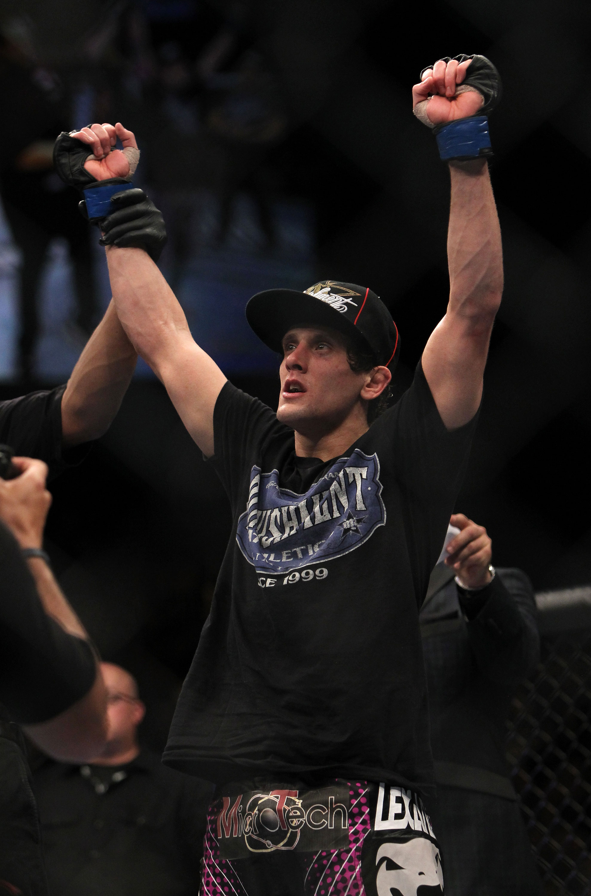 LAS VEGAS, NV - DECEMBER 30: Jimy Hettes is announced the winner in his bout against Nam Phan during the UFC 141 event at the MGM Grand Garden Arena on December 30, 2011 in Las Vegas, Nevada. (Photo by Josh Hedges/Zuffa LLC/Zuffa LLC via Getty Images) *** Local Caption *** Jimy Hettes