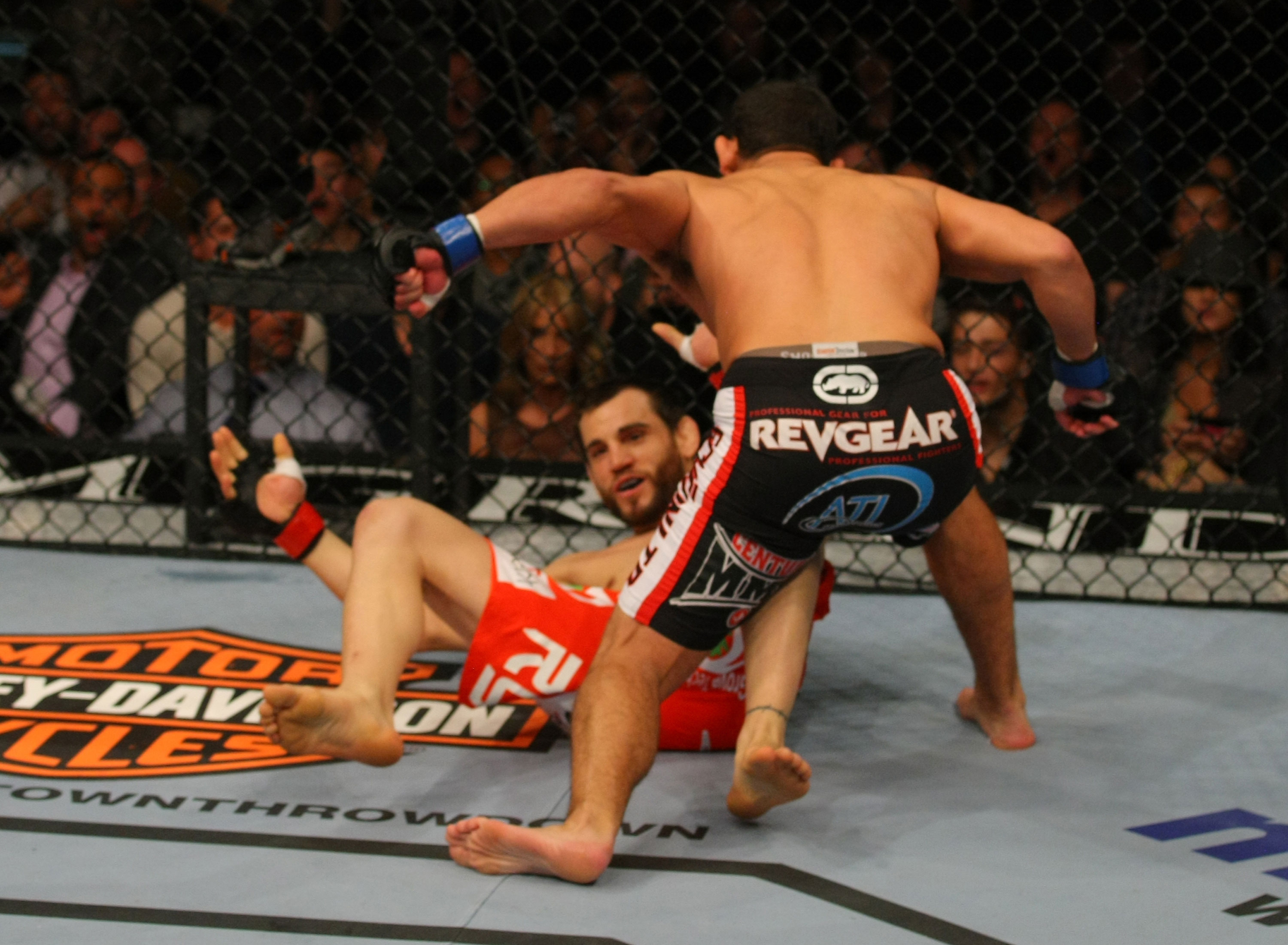 LAS VEGAS, NV - DECEMBER 30: Johny Hendricks (black shorts) throws a punch at Jon Fitch during the UFC 141 event at the MGM Grand Garden Arena on December 30, 2011 in Las Vegas, Nevada. (Photo by Donald Miralle/Zuffa LLC/Zuffa LLC via Getty Images) *** Local Caption *** Johny Hendricks; Jon Fitch