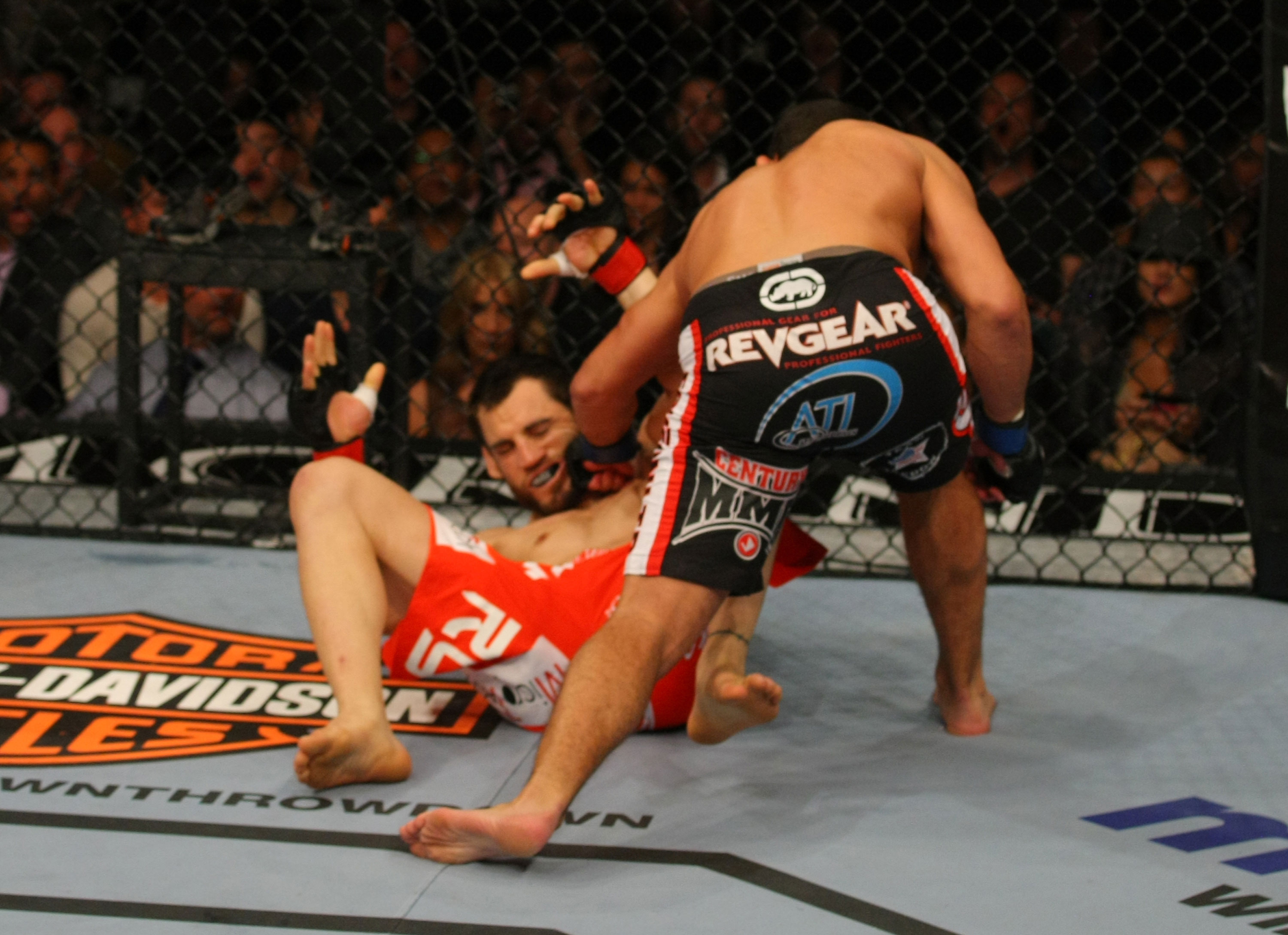 LAS VEGAS, NV - DECEMBER 30: Johny Hendricks (black shorts) punches Jon Fitch during the UFC 141 event at the MGM Grand Garden Arena on December 30, 2011 in Las Vegas, Nevada. (Photo by Donald Miralle/Zuffa LLC/Zuffa LLC via Getty Images) *** Local Caption *** Johny Hendricks; Jon Fitch