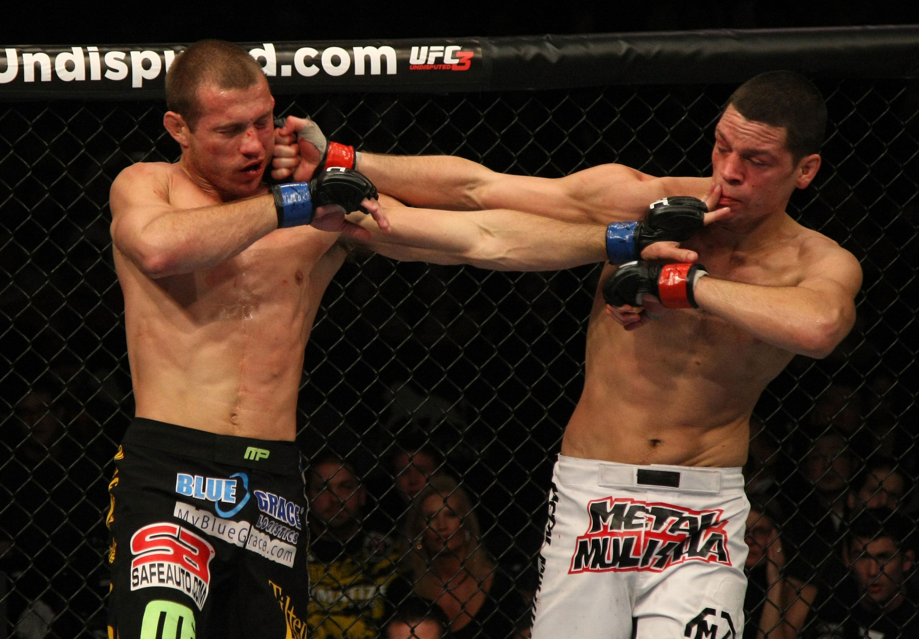 LAS VEGAS, NV - DECEMBER 30: Donald Cerrone (left) and Nate Diaz (right) exchange blows during the UFC 141 event at the MGM Grand Garden Arena on December 30, 2011 in Las Vegas, Nevada. (Photo by Donald Miralle/Zuffa LLC/Zuffa LLC via Getty Images) *** Local Caption *** Donald Cerrone; Nate Diaz