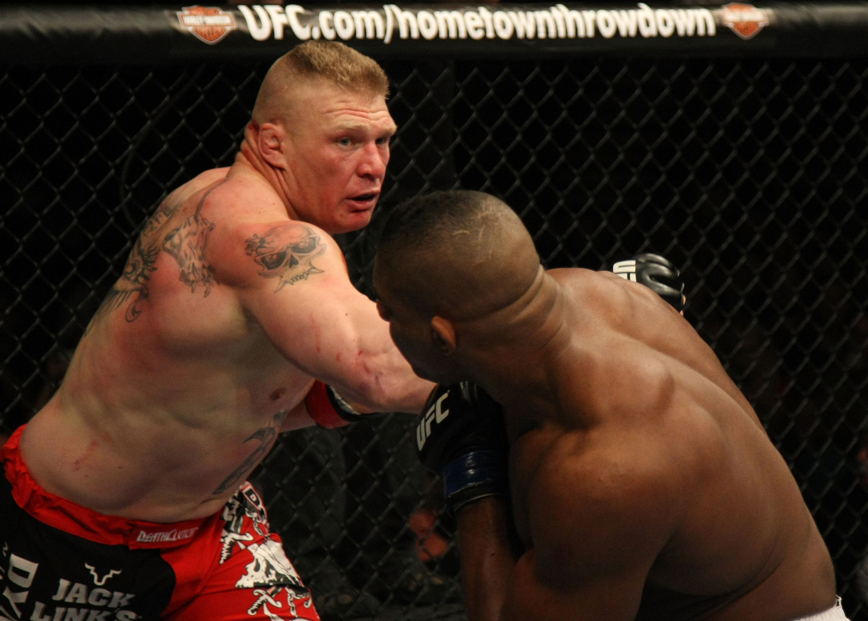 LAS VEGAS, NV - DECEMBER 30: Brock Lesnar (left) throws a punch at Alistair Overeem during the UFC 141 event at the MGM Grand Garden Arena on December 30, 2011 in Las Vegas, Nevada. (Photo by Donald Miralle/Zuffa LLC/Zuffa LLC via Getty Images) *** Local Caption *** Brock Lesnar; Alistair Overeem