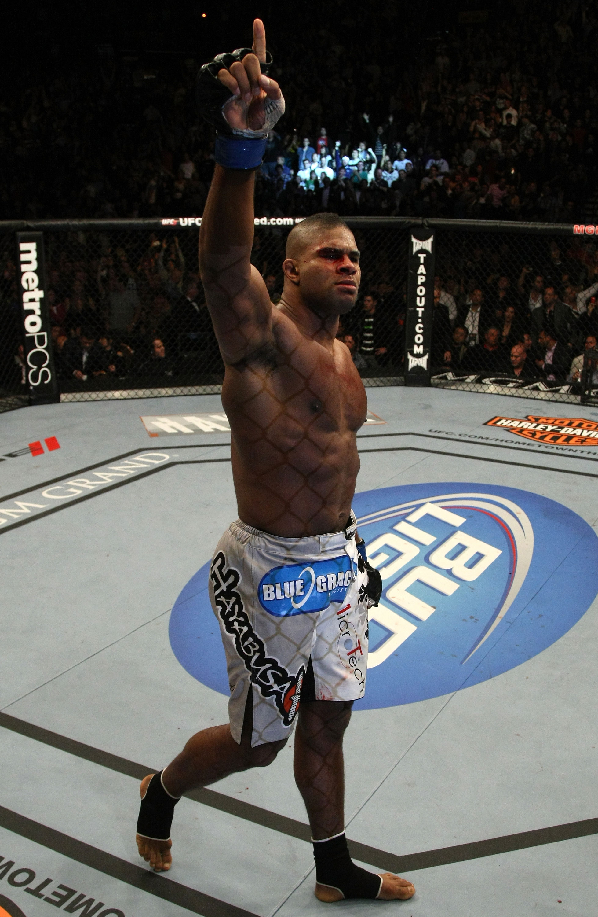 LAS VEGAS, NV - DECEMBER 30: Alistair Overeem celebrates his win over Brock Lesnar during the UFC 141 event at the MGM Grand Garden Arena on December 30, 2011 in Las Vegas, Nevada. (Photo by Donald Miralle/Zuffa LLC/Zuffa LLC via Getty Images) *** Local Caption *** Alistair Overeem