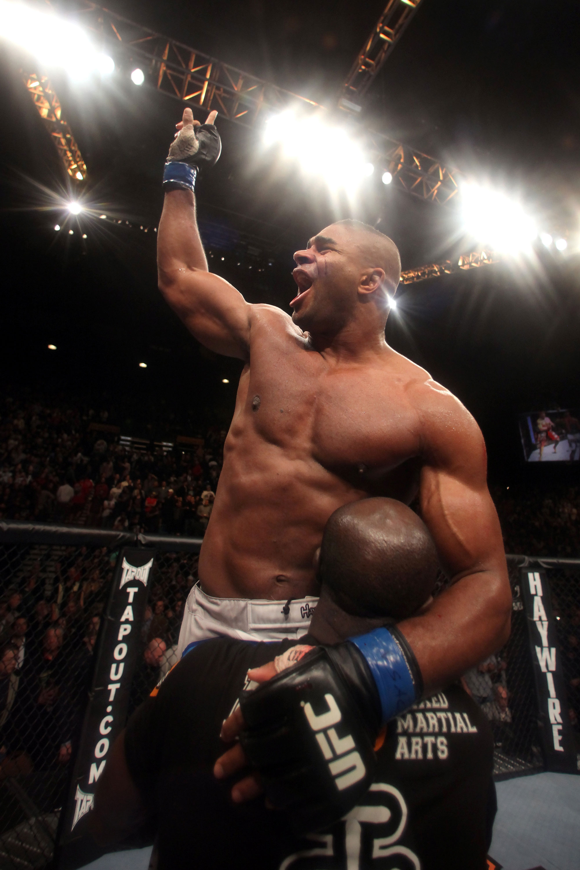 LAS VEGAS, NV - DECEMBER 30: Alistair Overeem celebrates his win over Brock Lesnar during the UFC 141 event at the MGM Grand Garden Arena on December 30, 2011 in Las Vegas, Nevada. (Photo by Donald Miralle/Zuffa LLC/Zuffa LLC via Getty Images) *** Local Caption *** Alistair Overeem