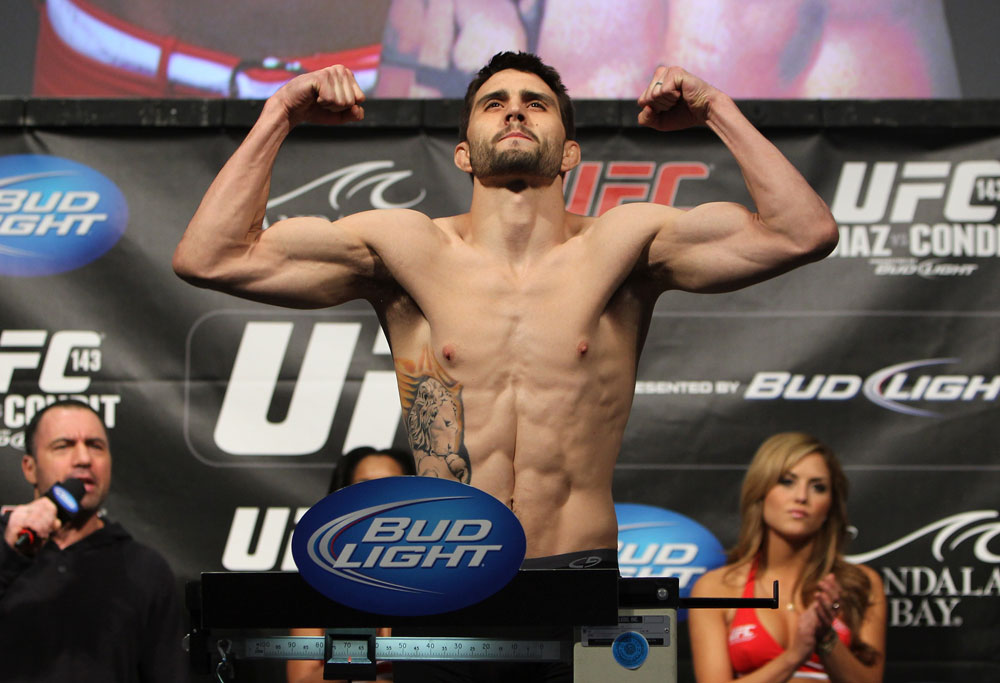 LAS VEGAS, NV - FEBRUARY 03: Carlos Condit weighs in during the UFC 143 official weigh in at Mandalay Bay Events Center on February 3, 2012 in Las Vegas, Nevada.|2:55:8 (Photo by Josh Hedges/Zuffa LLC/Zuffa LLC via Getty Images) *** Local Caption *** Carlos Condit