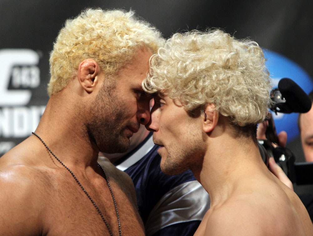 LAS VEGAS, NV - FEBRUARY 03: (L-R) Welterweight opponents Josh Koscheck and Mike Pierce face off after weighing in during the UFC 143 official weigh in at Mandalay Bay Events Center on February 3, 2012 in Las Vegas, Nevada.|2:55:8 (Photo by Josh Hedges/Zuffa LLC/Zuffa LLC via Getty Images) *** Local Caption *** Josh Koscheck; Mike Pierce