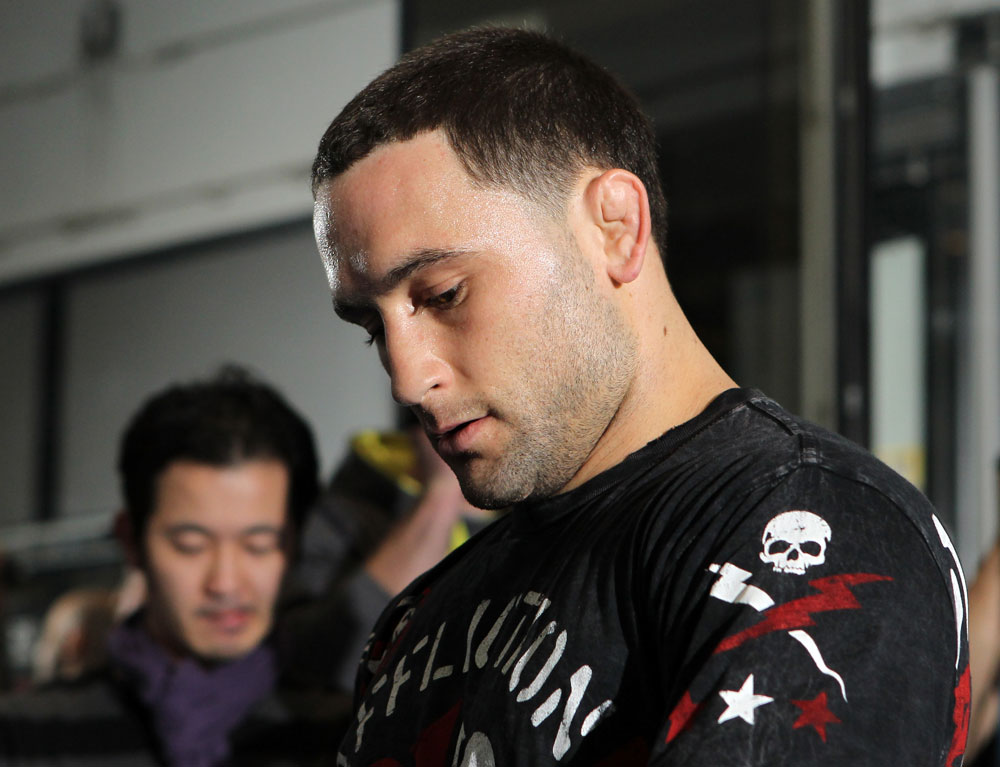 TOKYO, JAPAN - FEBRUARY 22: UFC Lightweight Champion Frankie Edgar works out for the media during the UFC 144 open workouts at Gold's Gym on February 22, 2012 in Tokyo, Japan. (Photo by Josh Hedges/Zuffa LLC/Zuffa LLC via Getty Images) *** Local Caption *** Frankie Edgar