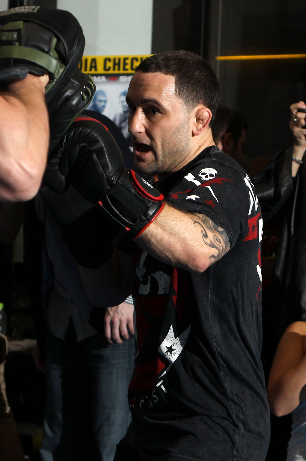 TOKYO, JAPAN - FEBRUARY 22: UFC Lightweight Champion Frankie Edgar works out for the media during the UFC 144 open workouts at Gold's Gym on February 22, 2012 in Tokyo, Japan. (Photo by Josh Hedges/Zuffa LLC/Zuffa LLC via Getty Images) *** Local Caption *** Frankie Edgar