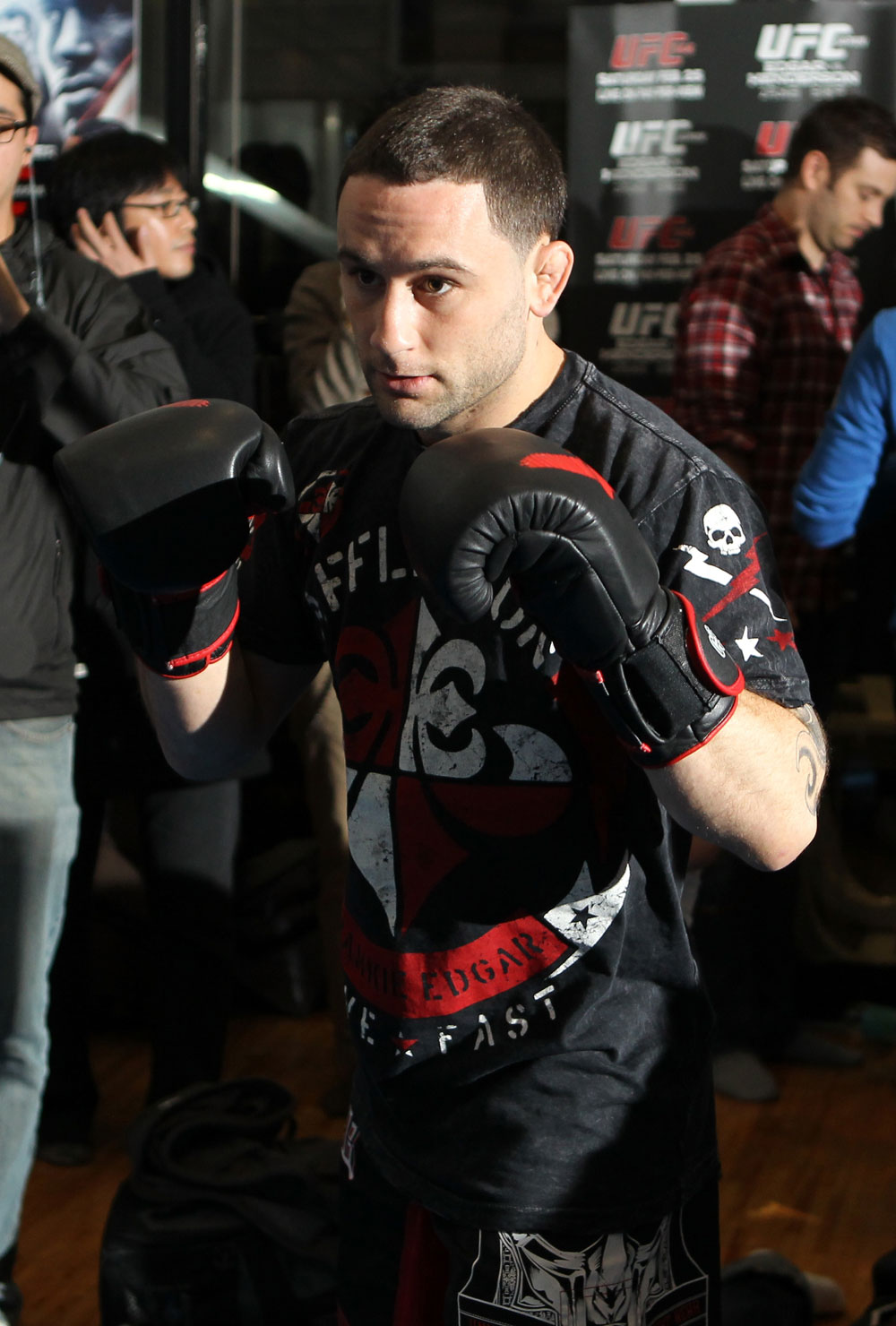 TOKYO, JAPAN - FEBRUARY 22: UFC Lightweight Champion Frankie Edgar works out for the media during the UFC 144 open workouts at Gold's Gym on February 22, 2012 in Tokyo, Japan. (Photo by Josh Hedges/Zuffa LLC/Zuffa LLC via Getty Images) *** Local Caption *** Frankie Edgar