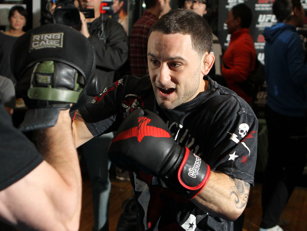TOKYO, JAPAN - FEBRUARY 22: UFC Lightweight Champion Frankie Edgar works out for the media during the UFC 144 open workouts at Gold's Gym on February 22, 2012 in Tokyo, Japan. (Photo by Josh Hedges/Zuffa LLC/Zuffa LLC via Getty Images) *** Local Caption *** Frankie Edgar