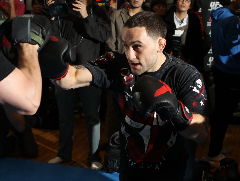 TOKYO, JAPAN - FEBRUARY 22: UFC Lightweight Champion Frankie Edgar works out for the media during the UFC 144 open workouts at Gold's Gym on February 22, 2012 in Tokyo, Japan. (Photo by Josh Hedges/Zuffa LLC/Zuffa LLC via Getty Images) *** Local Caption *** Frankie Edgar