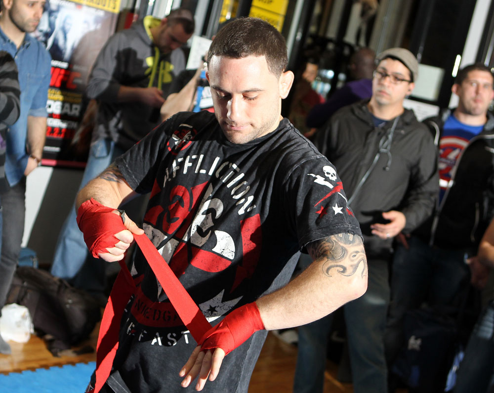 TOKYO, JAPAN - FEBRUARY 22: UFC Lightweight Champion Frankie Edgar works out for the media during the UFC 144 open workouts at Gold's Gym on February 22, 2012 in Tokyo, Japan. (Photo by Josh Hedges/Zuffa LLC/Zuffa LLC via Getty Images) *** Local Caption *** Frankie Edgar