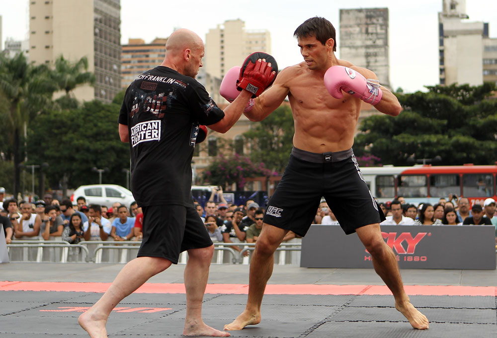 BELO HORIZONTE, BRAZIL - JUNE 20:   Rich Franklin works out for the fans and media during the UFC 147 open workouts at Praca da Estacao on June 20, 2012 in Belo Horizonte, Brazil.  (Photo by Josh Hedges/Zuffa LLC/Zuffa LLC via Getty Images)