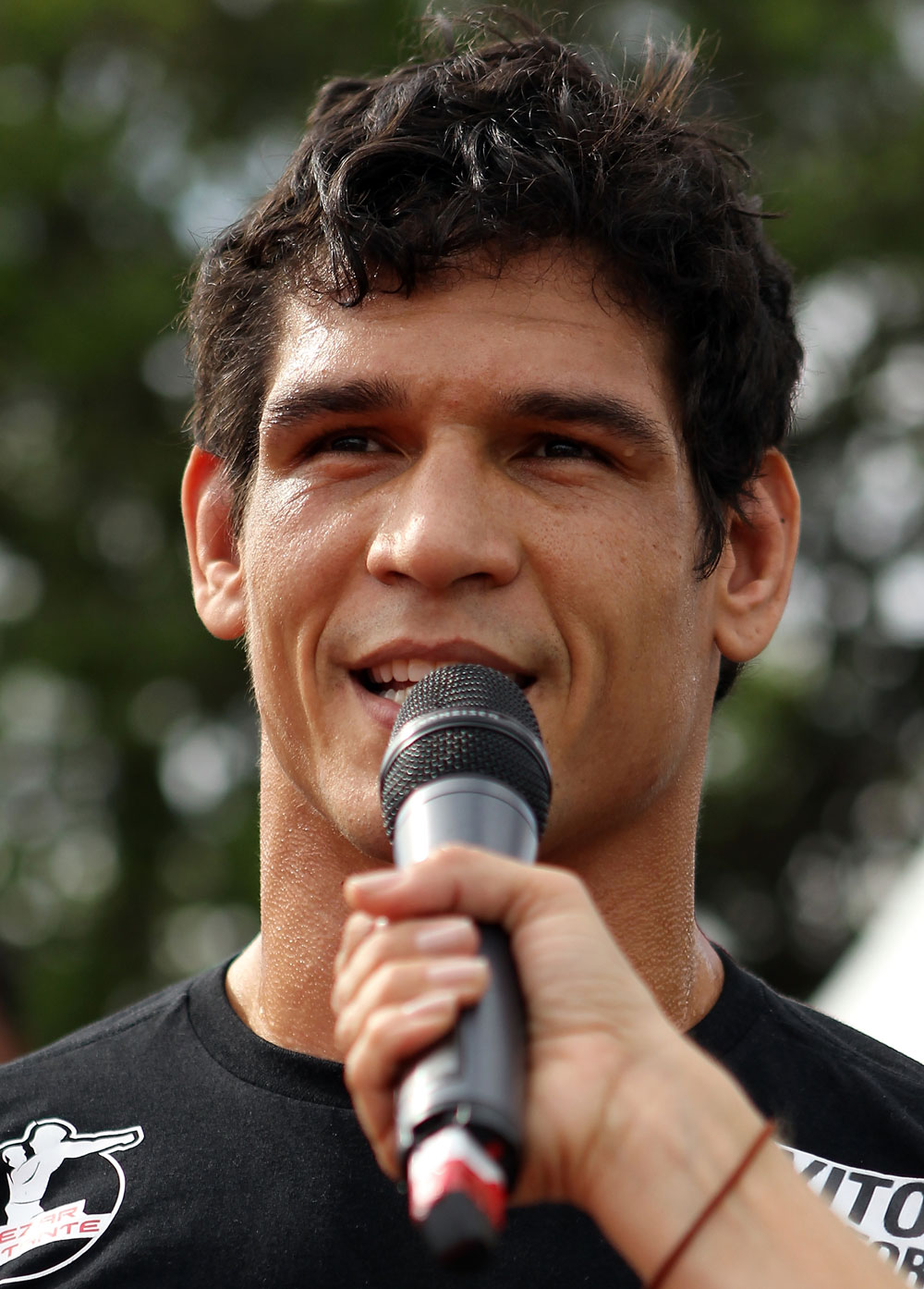 BELO HORIZONTE, BRAZIL - JUNE 20:   Cezar Ferreira is interviewed during the UFC 147 open workouts at Praca da Estacao on June 20, 2012 in Belo Horizonte, Brazil.  (Photo by Josh Hedges/Zuffa LLC/Zuffa LLC via Getty Images)