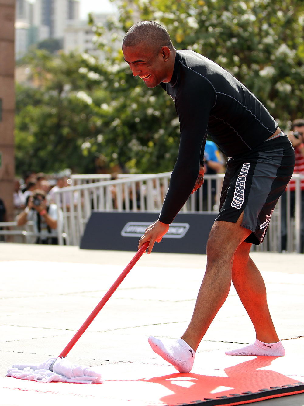 BELO HORIZONTE, BRAZIL - JUNE 20:   Sergio Moraes helps rinse the mats during the UFC 147 open workouts at Praca da Estacao on June 20, 2012 in Belo Horizonte, Brazil.  (Photo by Josh Hedges/Zuffa LLC/Zuffa LLC via Getty Images)