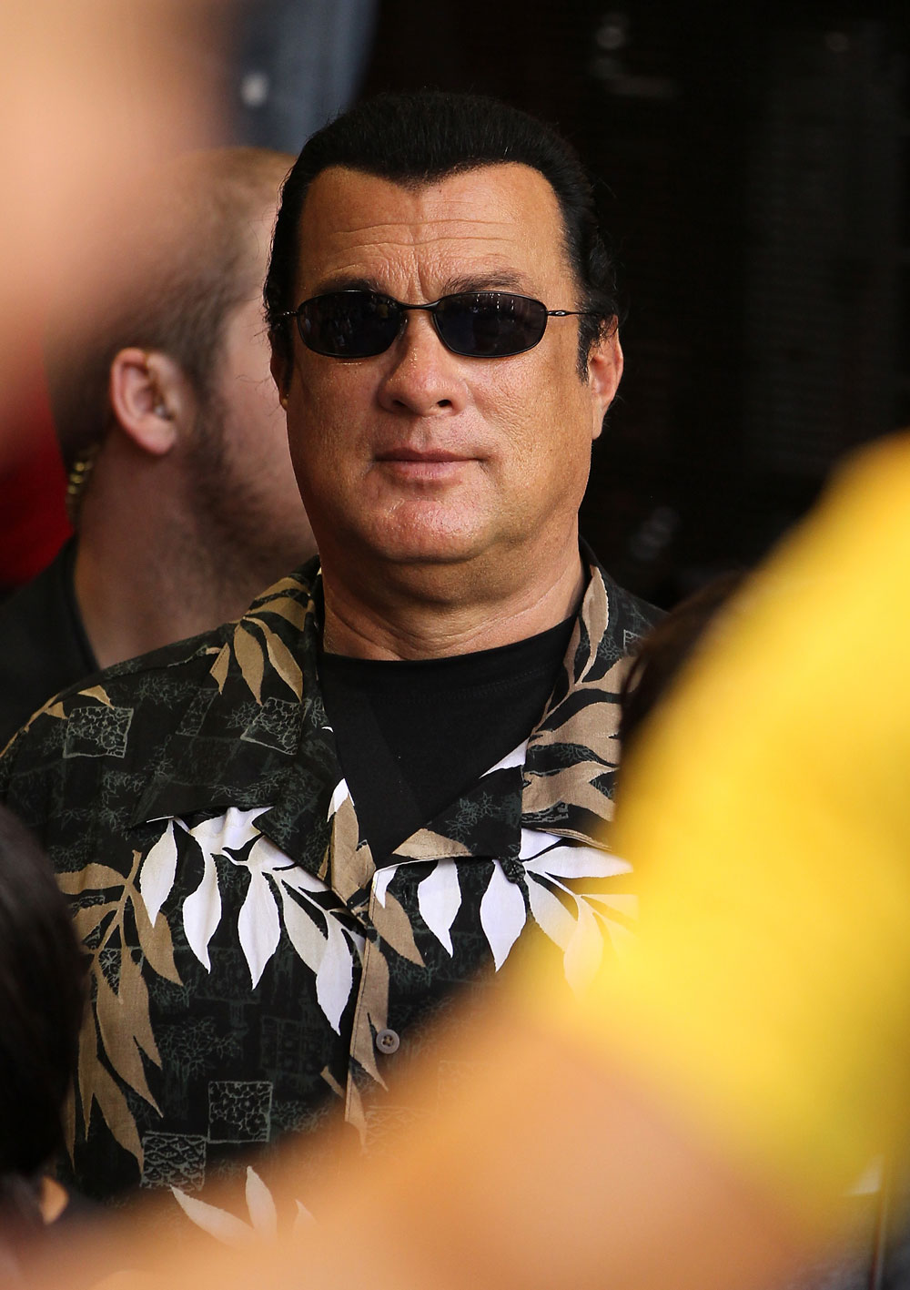 LAS VEGAS, NV - JULY 5: Actor Steven Seagal looks on as Anderson Silva works out during the UFC 148 Open Workouts inside XS nightclub at the Encore on July 5, 2012 in Las Vegas, Nevada. (Photo by Josh Hedges/Zuffa LLC/Zuffa LLC via Getty Images)