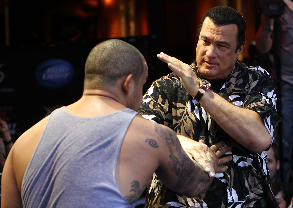 LAS VEGAS, NV - JULY 5: Martial arts actor Steven Seagal demonstrates a technique during the UFC 148 Open Workouts inside XS nightclub at the Encore on July 5, 2012 in Las Vegas, Nevada. (Photo by Josh Hedges/Zuffa LLC/Zuffa LLC via Getty Images)