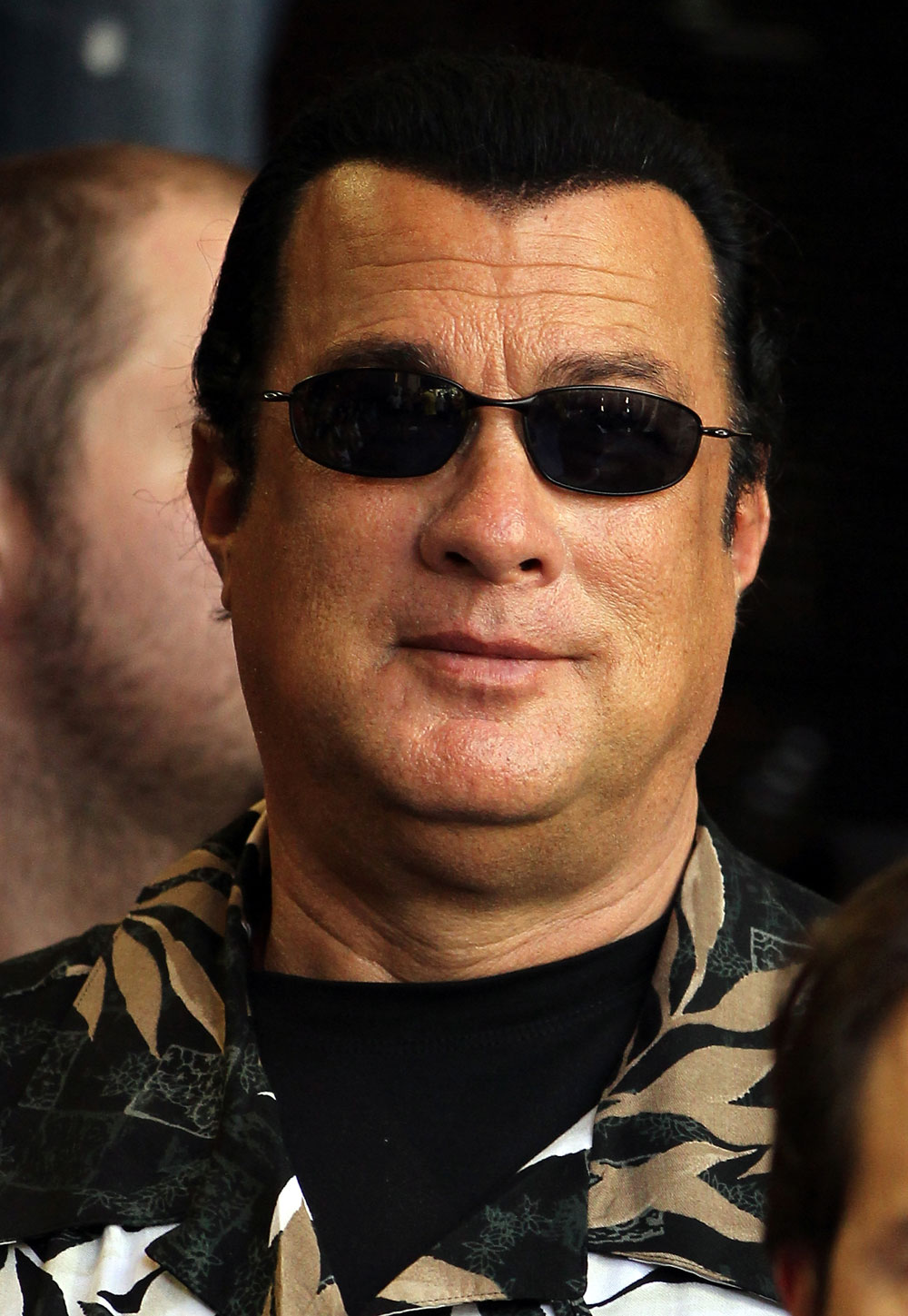 LAS VEGAS, NV - JULY 5: Actor Steven Seagal looks on as Anderson Silva works out during the UFC 148 Open Workouts inside XS nightclub at the Encore on July 5, 2012 in Las Vegas, Nevada. (Photo by Josh Hedges/Zuffa LLC/Zuffa LLC via Getty Images)