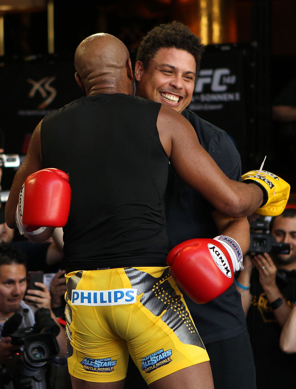LAS VEGAS, NV - JULY 5: (L-R) UFC Middleweight Champion Anderson Silva spars with Brazilian soccer legend Ronaldo during the UFC 148 Open Workouts inside XS nightclub at the Encore on July 5, 2012 in Las Vegas, Nevada. (Photo by Josh Hedges/Zuffa LLC/Zuffa LLC via Getty Images)