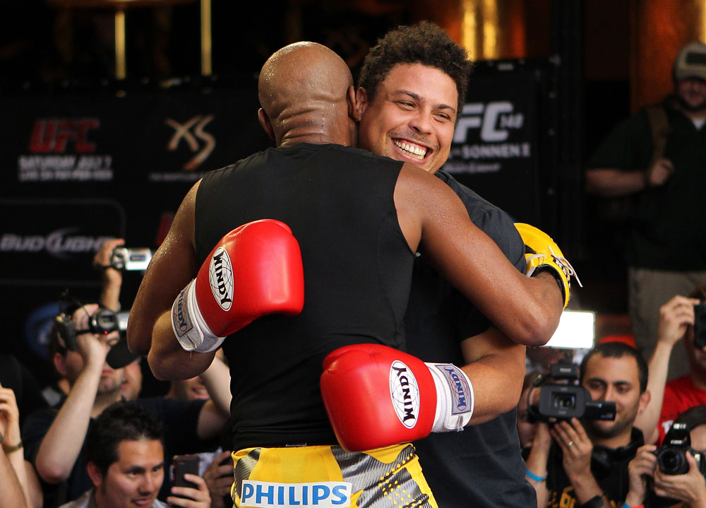 LAS VEGAS, NV - JULY 5: (L-R) UFC Middleweight Champion Anderson Silva spars with Brazilian soccer legend Ronaldo during the UFC 148 Open Workouts inside XS nightclub at the Encore on July 5, 2012 in Las Vegas, Nevada. (Photo by Josh Hedges/Zuffa LLC/Zuffa LLC via Getty Images)
