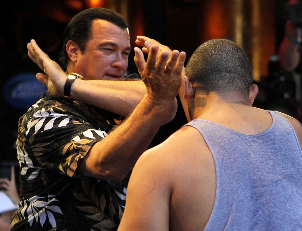 LAS VEGAS, NV - JULY 5: Martial arts actor Steven Seagal demonstrates a technique during the UFC 148 Open Workouts inside XS nightclub at the Encore on July 5, 2012 in Las Vegas, Nevada. (Photo by Josh Hedges/Zuffa LLC/Zuffa LLC via Getty Images)