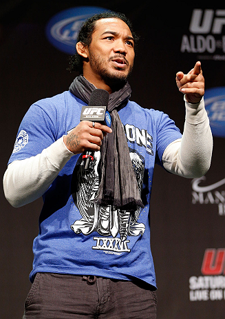 LAS VEGAS, NV - FEBRUARY 01:  UFC lightweight champion Benson Henderson interacts with fans during a Q&A session before the UFC 156 weigh-in on February 1, 2013 at Mandalay Bay Events Center in Las Vegas, Nevada.  (Photo by Josh Hedges/Zuffa LLC/Zuffa LLC via Getty Images)
