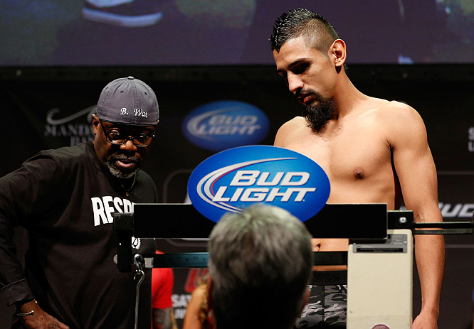 LAS VEGAS, NV - FEBRUARY 01:  Edwin Figueroa weighs in during the UFC 156 weigh-in on February 1, 2013 at Mandalay Bay Events Center in Las Vegas, Nevada.  (Photo by Josh Hedges/Zuffa LLC/Zuffa LLC via Getty Images)