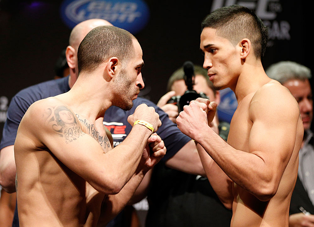 LAS VEGAS, NV - FEBRUARY 01:  (L-R) Opponents Chico Camus and Dustin Kimura face off during the UFC 156 weigh-in on February 1, 2013 at Mandalay Bay Events Center in Las Vegas, Nevada.  (Photo by Josh Hedges/Zuffa LLC/Zuffa LLC via Getty Images)