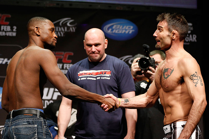 LAS VEGAS, NV - FEBRUARY 01:  (L-R) Opponents Yves Edwards and Isaac Vallie-Flag face off during the UFC 156 weigh-in on February 1, 2013 at Mandalay Bay Events Center in Las Vegas, Nevada.  (Photo by Josh Hedges/Zuffa LLC/Zuffa LLC via Getty Images)