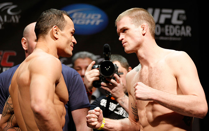 LAS VEGAS, NV - FEBRUARY 01:  (L-R) Opponents Gleison Tibau and Evan Dunham face off during the UFC 156 weigh-in on February 1, 2013 at Mandalay Bay Events Center in Las Vegas, Nevada.  (Photo by Josh Hedges/Zuffa LLC/Zuffa LLC via Getty Images)