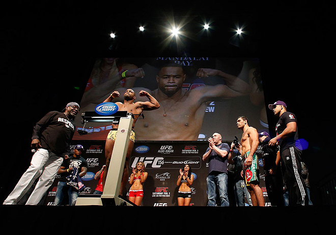 LAS VEGAS, NV - FEBRUARY 01:  Rashad Evans weighs in as opponent Antonio Rogerio Nogueira looks on during the UFC 156 weigh-in on February 1, 2013 at Mandalay Bay Events Center in Las Vegas, Nevada.  (Photo by Josh Hedges/Zuffa LLC/Zuffa LLC via Getty Images)
