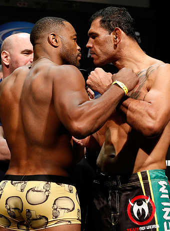 LAS VEGAS, NV - FEBRUARY 01:  (L-R) Opponents Rashad Evans and Antonio Rogerio Nogueira face off during the UFC 156 weigh-in on February 1, 2013 at Mandalay Bay Events Center in Las Vegas, Nevada.  (Photo by Josh Hedges/Zuffa LLC/Zuffa LLC via Getty Images)