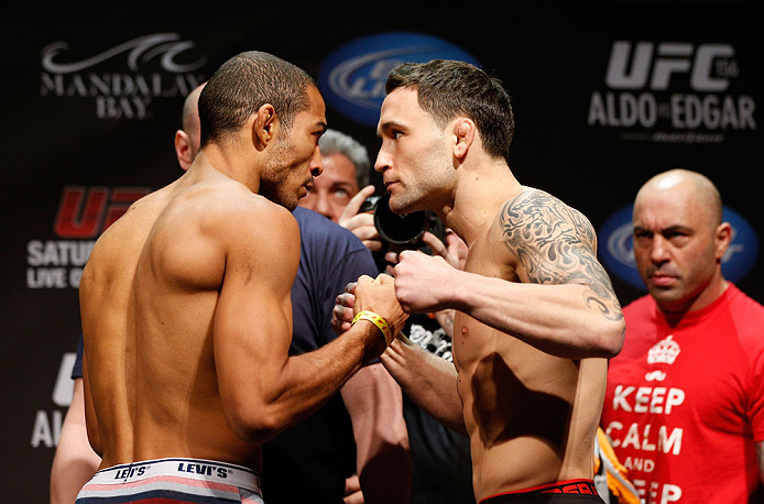 LAS VEGAS, NV - FEBRUARY 01:  (L-R) Opponents Jose Aldo and Frankie Edgar face off during the UFC 156 weigh-in on February 1, 2013 at Mandalay Bay Events Center in Las Vegas, Nevada.  (Photo by Josh Hedges/Zuffa LLC/Zuffa LLC via Getty Images)