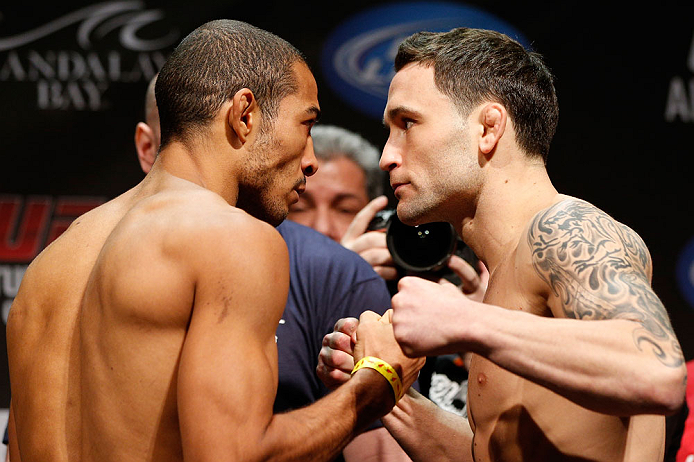 LAS VEGAS, NV - FEBRUARY 01:  (L-R) Opponents Jose Aldo and Frankie Edgar face off during the UFC 156 weigh-in on February 1, 2013 at Mandalay Bay Events Center in Las Vegas, Nevada.  (Photo by Josh Hedges/Zuffa LLC/Zuffa LLC via Getty Images)