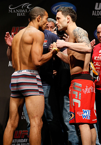 LAS VEGAS, NV - FEBRUARY 01:  (L-R) Opponents Jose Aldo and Frankie Edgar face off during the UFC 156 weigh-in on February 1, 2013 at Mandalay Bay Events Center in Las Vegas, Nevada.  (Photo by Josh Hedges/Zuffa LLC/Zuffa LLC via Getty Images)