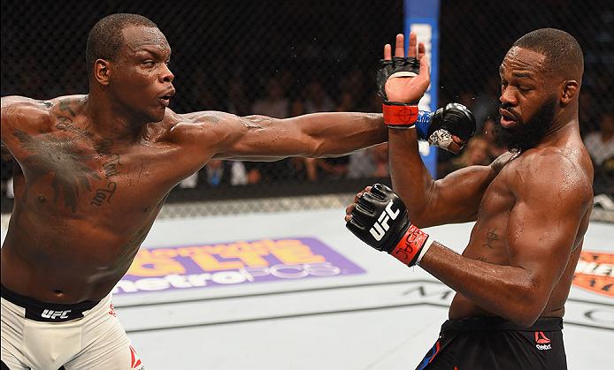 LAS VEGAS, NV - APRIL 23: (L-R) Ovince Saint Preux punches Jon Jones in their interim UFC light heavyweight championship bout during the UFC 197 event inside MGM Grand Garden Arena on April 23, 2016 in Las Vegas, Nevada. (Photo by Josh Hedges/Zuffa LLC)