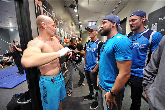 LAS VEGAS, NV - OCTOBER 29: (L-R) Team Penn fighter Daniel Spohn celebrates with his team outside of the locker room after defeating Team Edgar fighter Todd Monaghan in their preliminary fight during filming of season nineteen of The Ultimate Fighter on October 29, 2013 in Las Vegas, Nevada. (Photo by Jeff Bottari/Zuffa LLC/Zuffa LLC via Getty Images) *** Local Caption ***Daniel Spohn