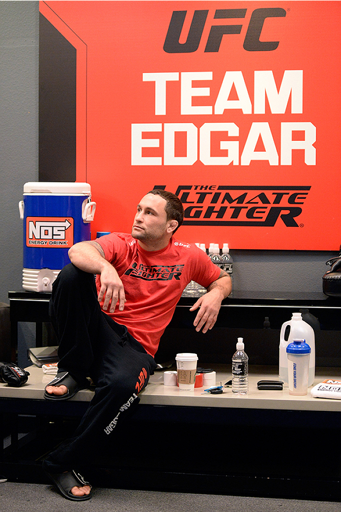 LAS VEGAS, NV - OCTOBER 29: Coach Frankie Edgar sits in the locker room before his fighter Todd Monaghan faces Team Penn fighter Daniel Spohn in their preliminary fight during filming of season nineteen of The Ultimate Fighter on October 29, 2013 in Las Vegas, Nevada. (Photo by Jeff Bottari/Zuffa LLC/Zuffa LLC via Getty Images) *** Local Caption *** Frankie Edgar