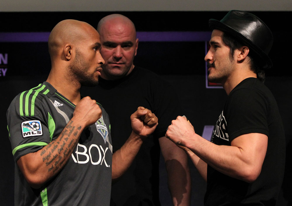 SYDNEY, AUSTRALIA - MARCH 01:  (L-R) Opponents Demetrious Johnson and Ian McCall face off during the UFC on FX press conference at the Star Casino on March 1, 2012 in Sydney, Australia.  (Photo by Josh Hedges/Zuffa LLC/Zuffa LLC via Getty Images) *** Local Caption *** Demetrious Johnson; Ian McCall