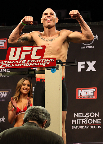 LAS VEGAS, NV - DECEMBER 14:  Jared Papazian on scale during TUF 16 Finale weigh in on December 14, 2012  at the Joint at the Hard Rock in Las Vegas, Nevada.  (Photo by Jim Kemper/Zuffa LLC/Zuffa LLC via Getty Images)
