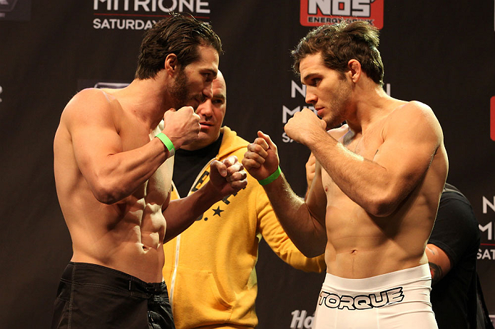 LAS VEGAS, NV - DECEMBER 14:  (L-R) Mike Rio and John Cofer face off during TUF 16 Finale weigh in on December 14, 2012  at the Joint at the Hard Rock in Las Vegas, Nevada.  (Photo by Jim Kemper/Zuffa LLC/Zuffa LLC via Getty Images)