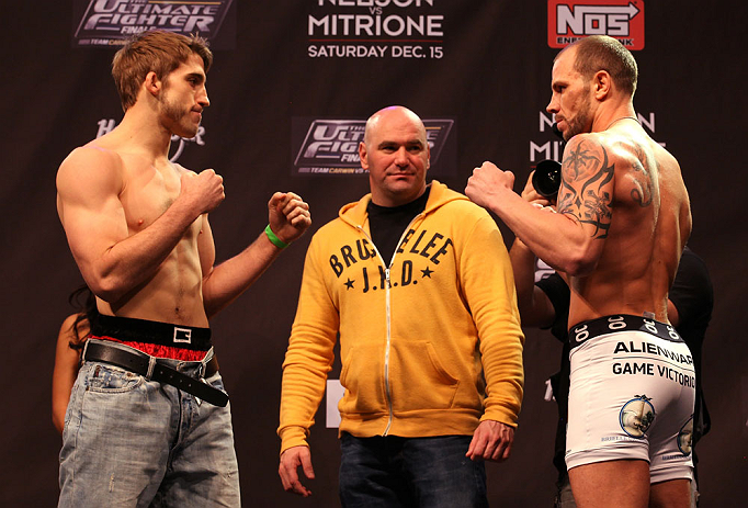 LAS VEGAS, NV - DECEMBER 14:  (L-R) TJ Waldburger and Nick Catone face off as UFC President Dana White looks on during TUF 16 Finale weigh in on December 14, 2012  at the Joint at the Hard Rock in Las Vegas, Nevada.  (Photo by Jim Kemper/Zuffa LLC/Zuffa LLC via Getty Images)