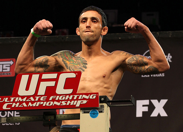 LAS VEGAS, NV - DECEMBER 14:  Marcos Vinicius poses on scale during TUF 16 Finale weigh in on December 14, 2012  at the Joint at the Hard Rock in Las Vegas, Nevada.  (Photo by Jim Kemper/Zuffa LLC/Zuffa LLC via Getty Images)