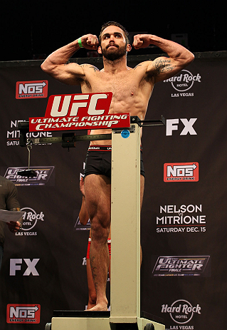 LAS VEGAS, NV - DECEMBER 14:  Jamie Varner stands on the scale during TUF 16 Finale weigh in on December 14, 2012  at the Joint at the Hard Rock in Las Vegas, Nevada.  (Photo by Jim Kemper/Zuffa LLC/Zuffa LLC via Getty Images)
