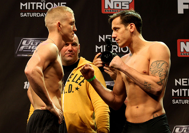LAS VEGAS, NV - DECEMBER 14:  (L-R) Colton Smith and Mike Ricci face off during TUF 16 Finale weigh in on December 14, 2012  at the Joint at the Hard Rock in Las Vegas, Nevada.  (Photo by Jim Kemper/Zuffa LLC/Zuffa LLC via Getty Images)