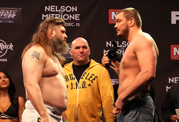 LAS VEGAS, NV - DECEMBER 14:  (L-R) Roy Nelson and Matt Mitrione face off while UFC President Dana White looks on during TUF 16 Finale weigh in on December 14, 2012  at the Joint at the Hard Rock in Las Vegas, Nevada.  (Photo by Jim Kemper/Zuffa LLC/Zuffa LLC via Getty Images)