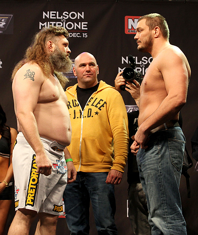 LAS VEGAS, NV - DECEMBER 14:  (L-R) Roy Nelson and Matt Mitrione face off while UFC President Dana White looks on during TUF 16 Finale weigh in on December 14, 2012  at the Joint at the Hard Rock in Las Vegas, Nevada.  (Photo by Jim Kemper/Zuffa LLC/Zuffa LLC via Getty Images)