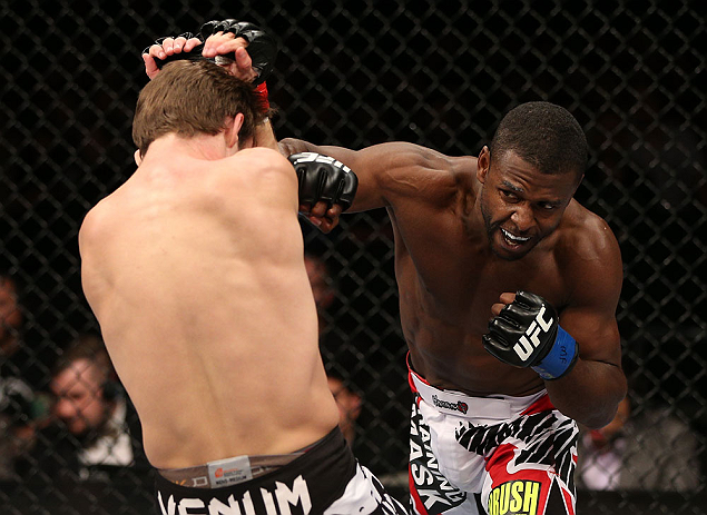 NOTTINGHAM, ENGLAND - SEPTEMBER 29: (R-L) Yves Jabouin punches Brad Pickett during their bantamweight fight at the UFC on Fuel TV event at Capital FM Arena on September 29, 2012 in Nottingham, England. (Photo by Josh Hedges/Zuffa LLC/Zuffa LLC via Getty Images)