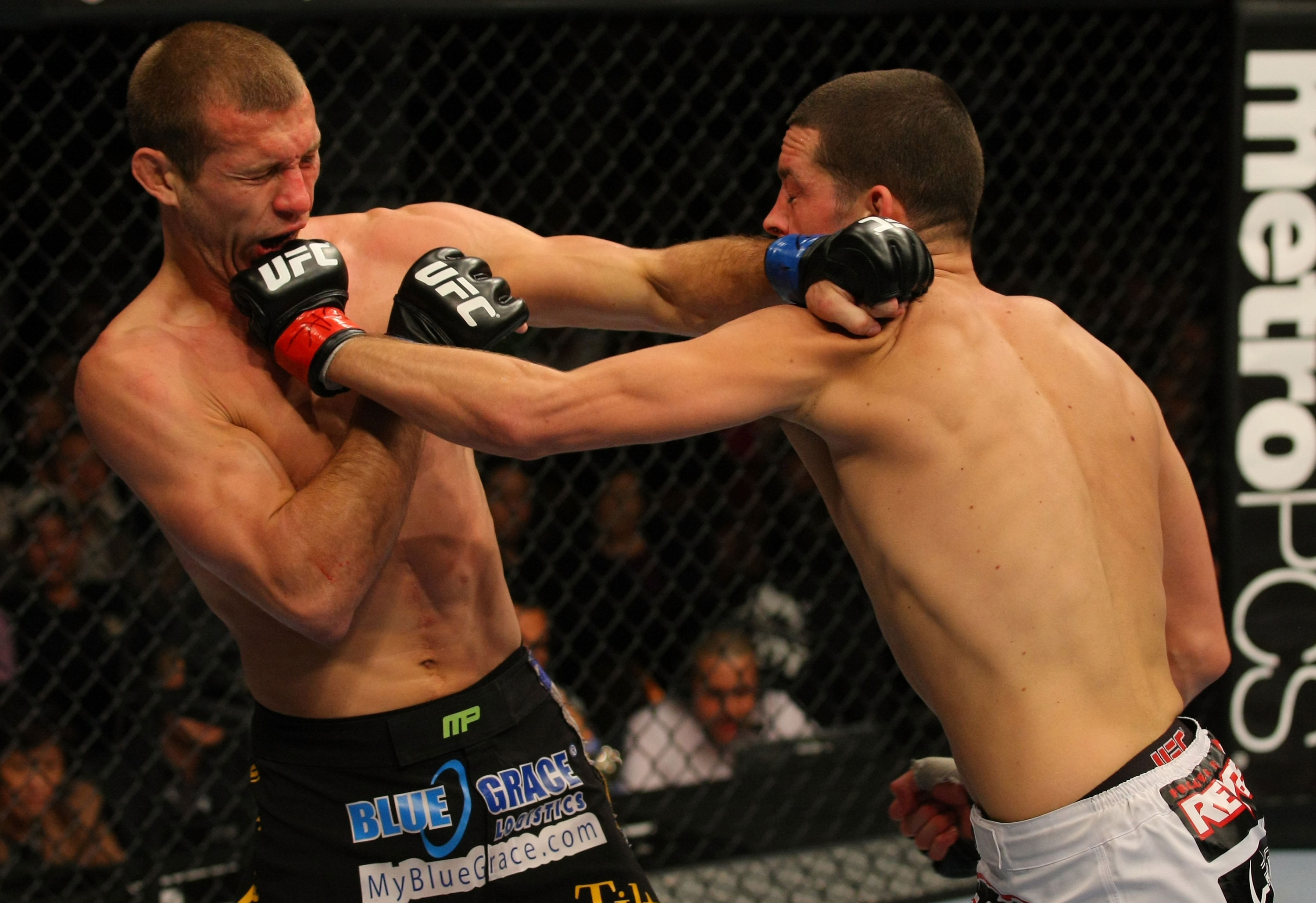 LAS VEGAS, NV - DECEMBER 30: Donald Cerrone (left) and Nate Diaz (right) exchange blows during the UFC 141 event at the MGM Grand Garden Arena on December 30, 2011 in Las Vegas, Nevada. (Photo by Donald Miralle/Zuffa LLC/Zuffa LLC via Getty Images) *** Local Caption *** Donald Cerrone; Nate Diaz