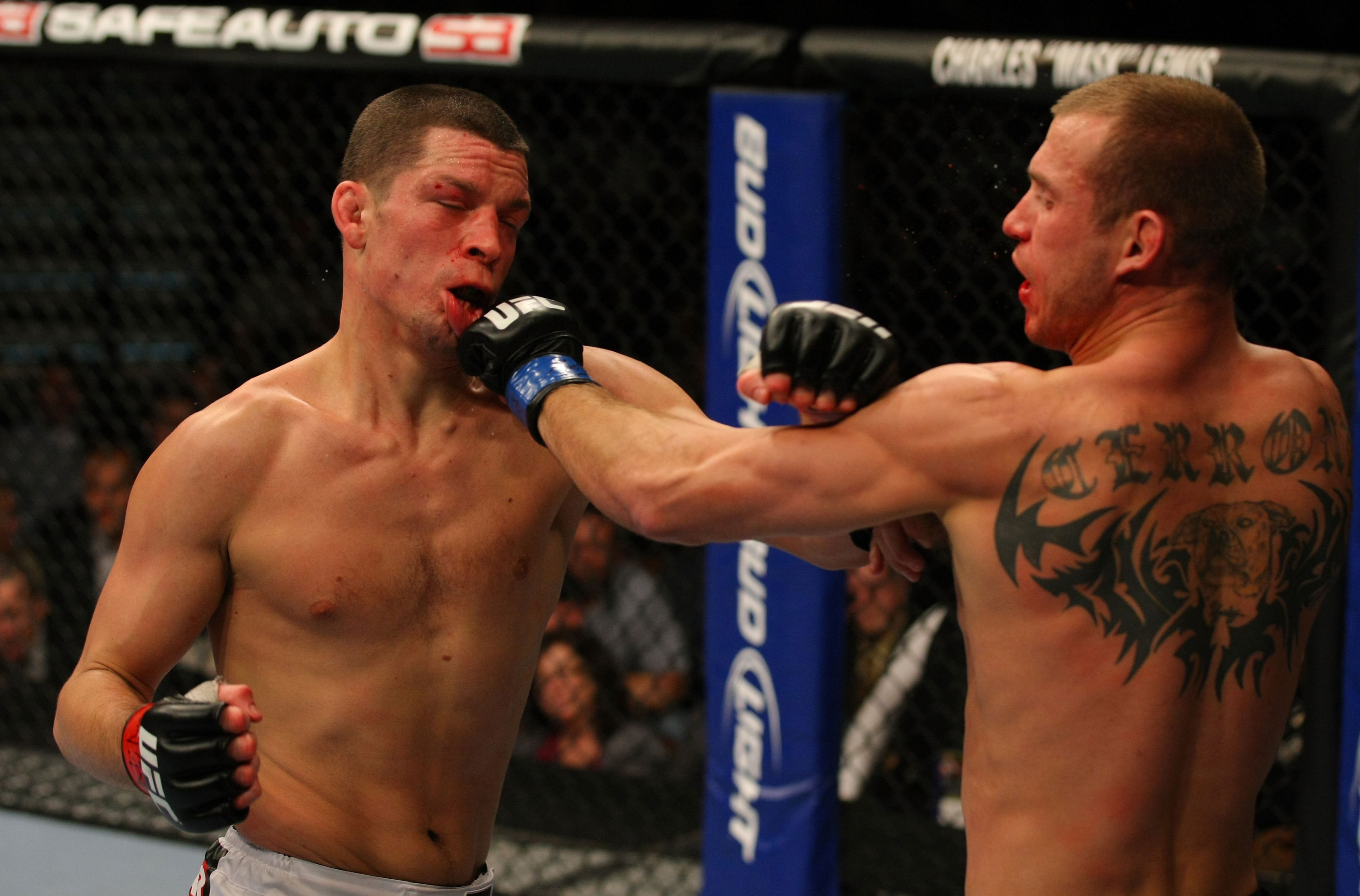 LAS VEGAS, NV - DECEMBER 30: Donald Cerrone (right) and Nate Diaz (left) exchange blows during the UFC 141 event at the MGM Grand Garden Arena on December 30, 2011 in Las Vegas, Nevada. (Photo by Donald Miralle/Zuffa LLC/Zuffa LLC via Getty Images) *** Local Caption *** Donald Cerrone; Nate Diaz