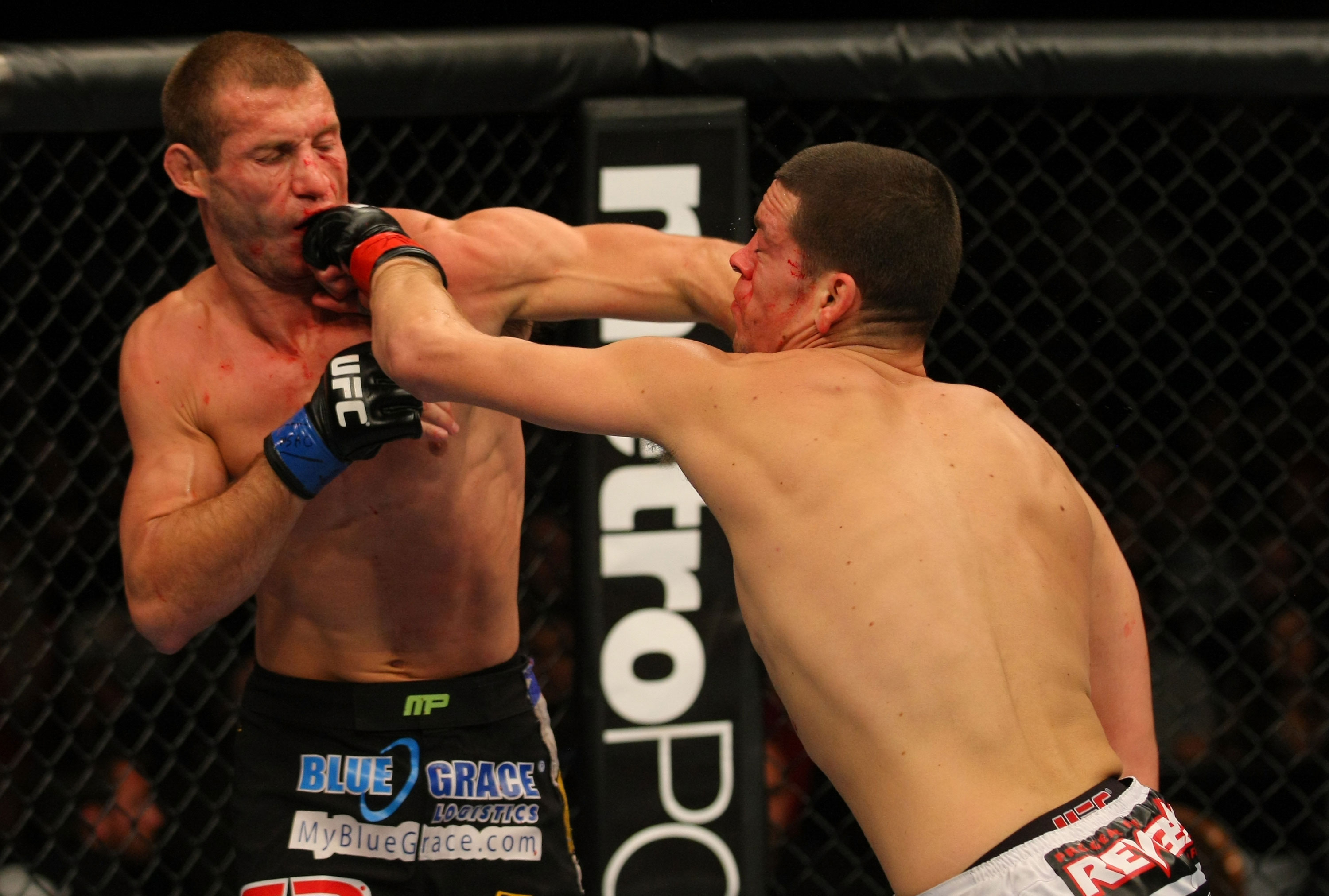 LAS VEGAS, NV - DECEMBER 30: Donald Cerrone (left) and Nate Diaz (right) exchange blows during the UFC 141 event at the MGM Grand Garden Arena on December 30, 2011 in Las Vegas, Nevada. (Photo by Donald Miralle/Zuffa LLC/Zuffa LLC via Getty Images) *** Local Caption *** Donald Cerrone; Nate Diaz